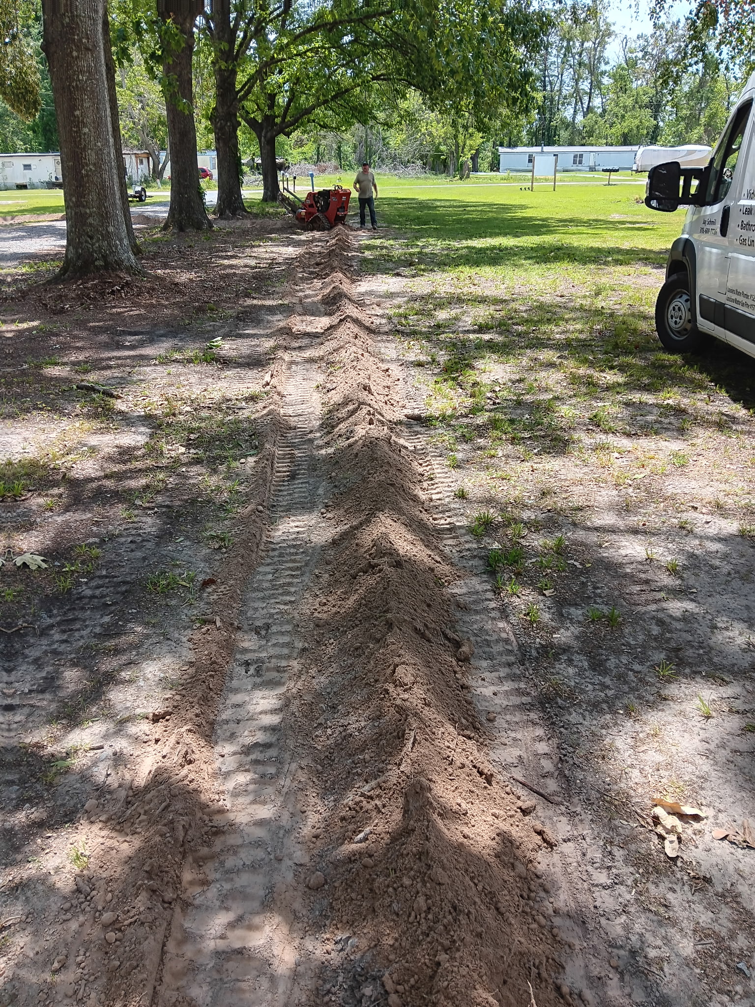 Ditch Witch trencher operation - McKinney, TX
