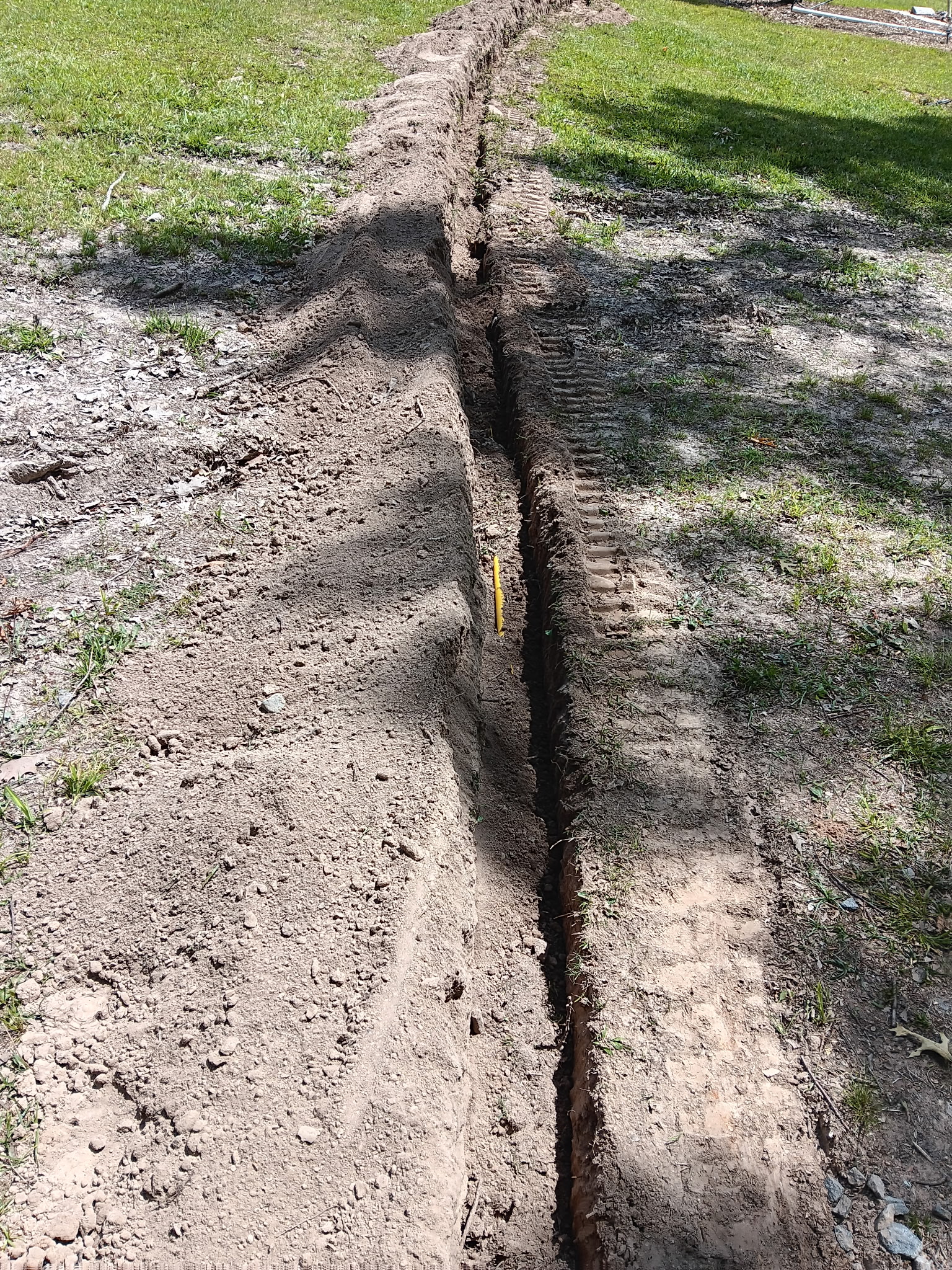 Trench depth view with yellow line marker, McKinney, TX